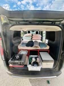 Kia electric campervan bed and camping equipment