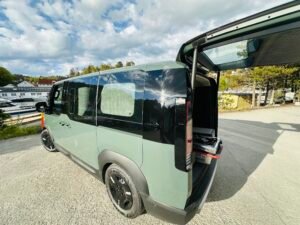 Kia electric campervan near Bergen marina